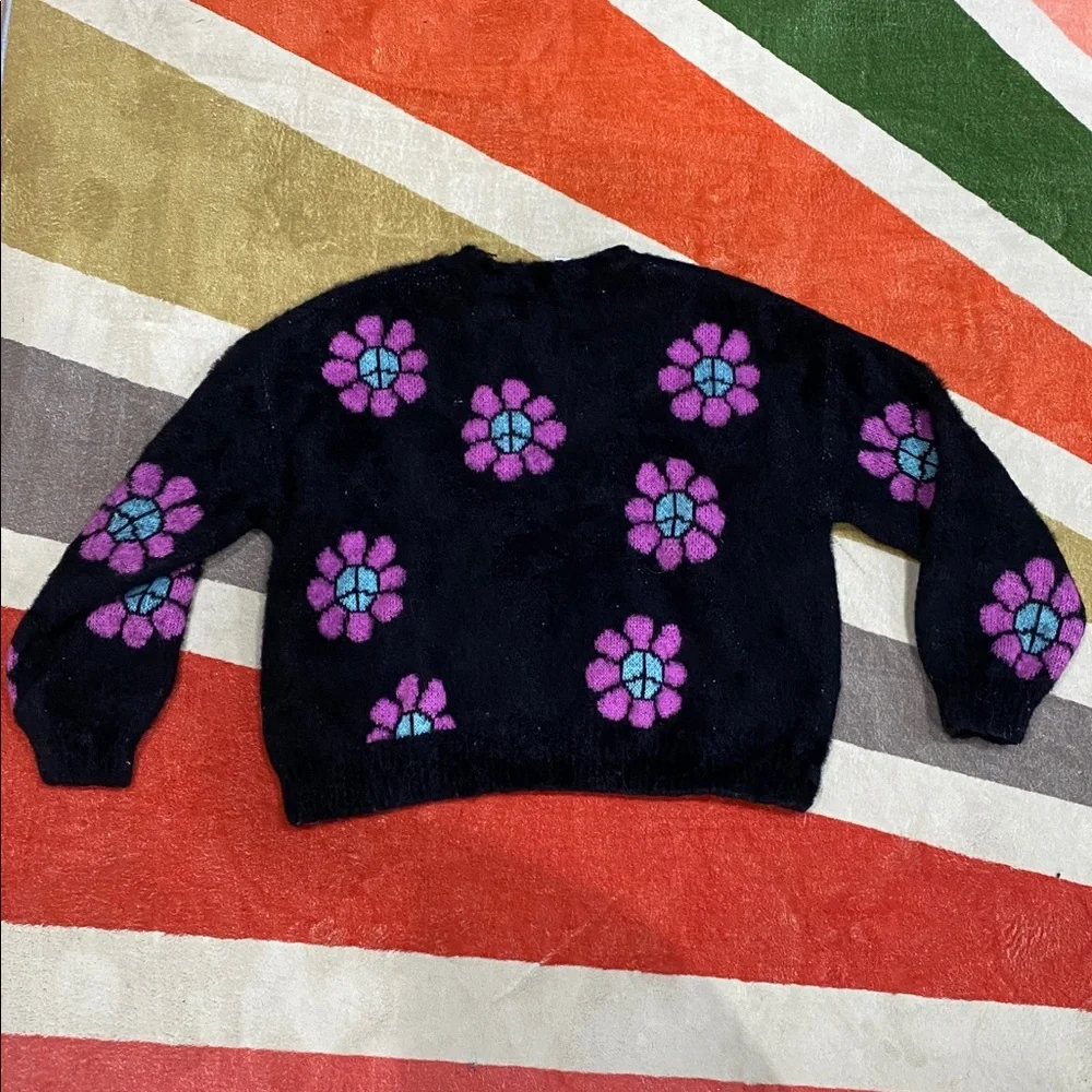 3/$10 Justice Black Sweater with Purple and Blue Floral Design